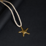 Collier Cordon Ivoire & Pendentif Étoile de Mer Dorée
