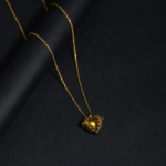 Collier Chaîne Torsadée & Pendentif Sphère Cage Dorée