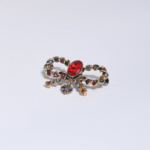 Broche Nœud Rubis & Cristaux Multicolores