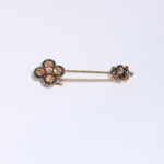 Épingle Double Fleur Dorée Cristaux Champagne